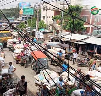 গোদাগাড়ী ধানের আড়ৎ এ যেন আরেক যন্ত্রনা